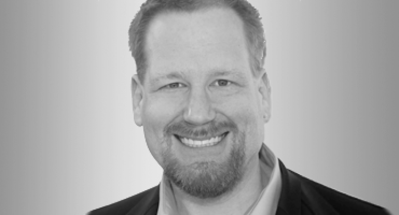 Black and white headshot of Gabe Howard Speaker; Author; Host of Healthline Media's Inside Mental Health Podcast